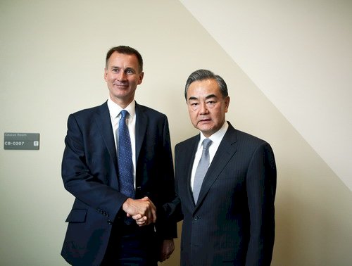 王毅會韓特 要求英堅定立場南海議題不選邊
