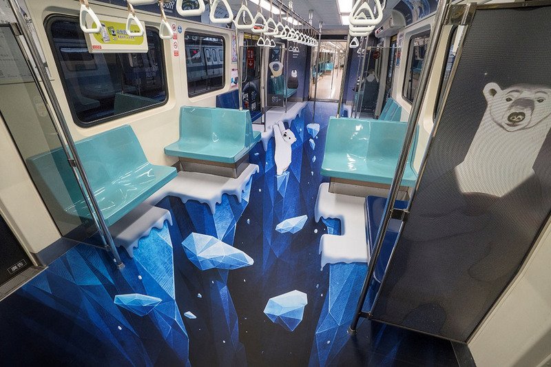 有企業與台北捷運合作，推出「地球一小時3D彩繪列車」，設計概念是以地球暖化為主題，運用3D冰層暖化設計表達北極熊與極地動物的生存正受到威脅，呈現冰川溶解的危機感。（歐萊德提供）