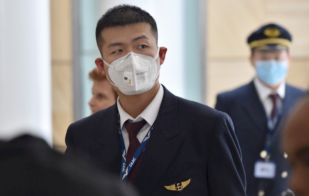 肺炎人人自危 武漢飛出的末班機：大家都戴口罩